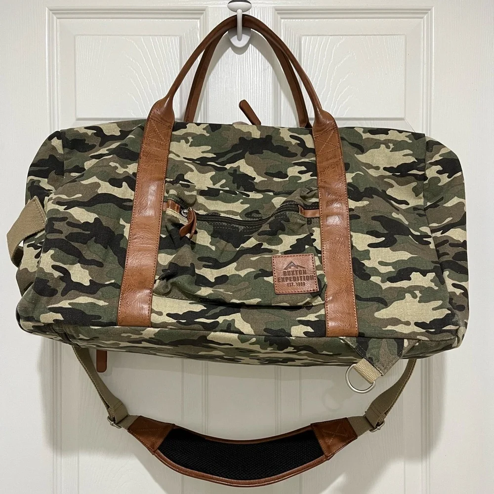 BUXTON MEN'S EXPEDITION II HUNTINGTON CANVAS CONVERTIBLE DUFFEL L20”xW9”xH12”